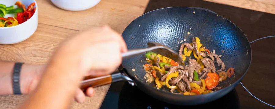 Wok op inductie: alles wat je moet weten voor je koopt