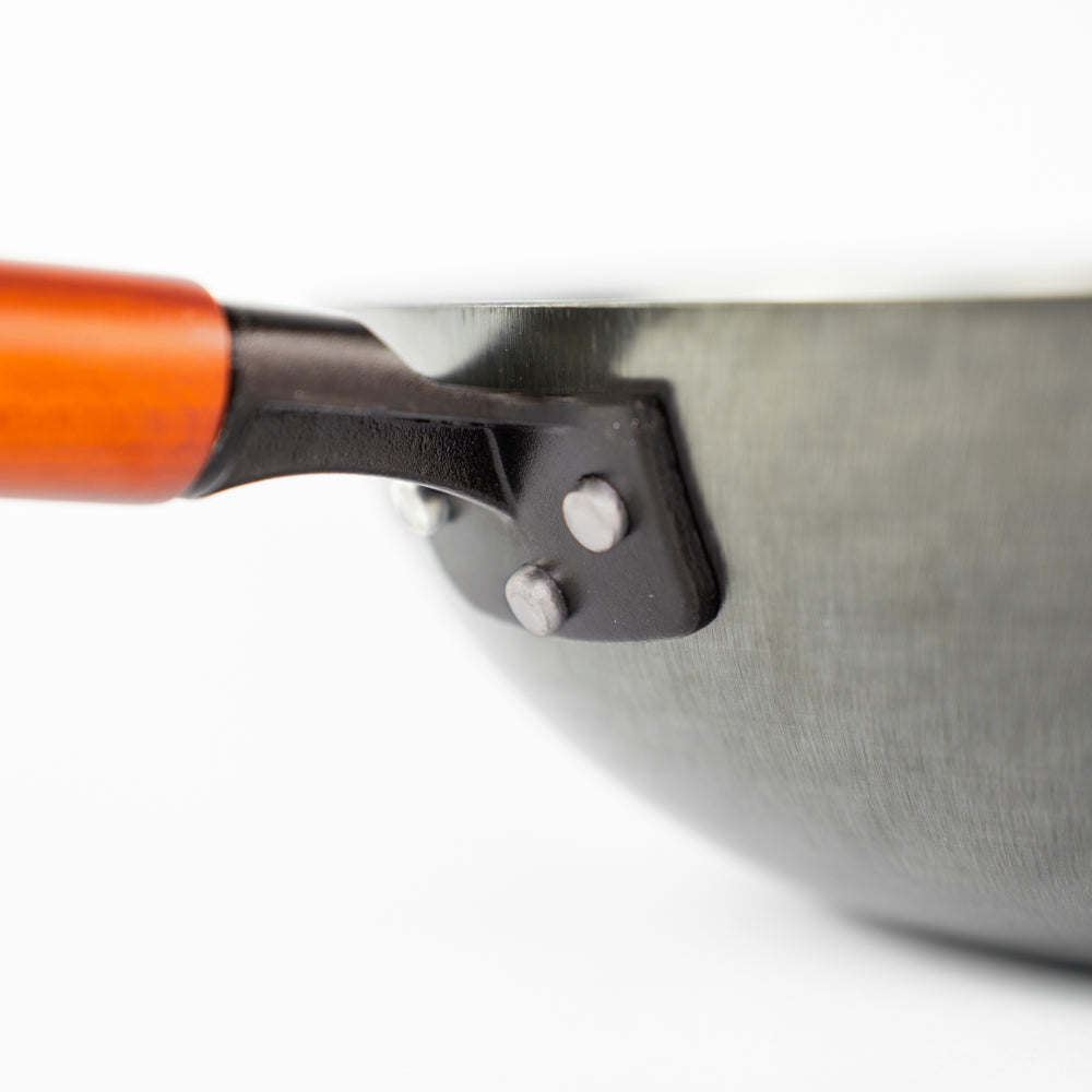 Le Oniri plaatstalen wok inductie met maatindicatie en wanddikte detail