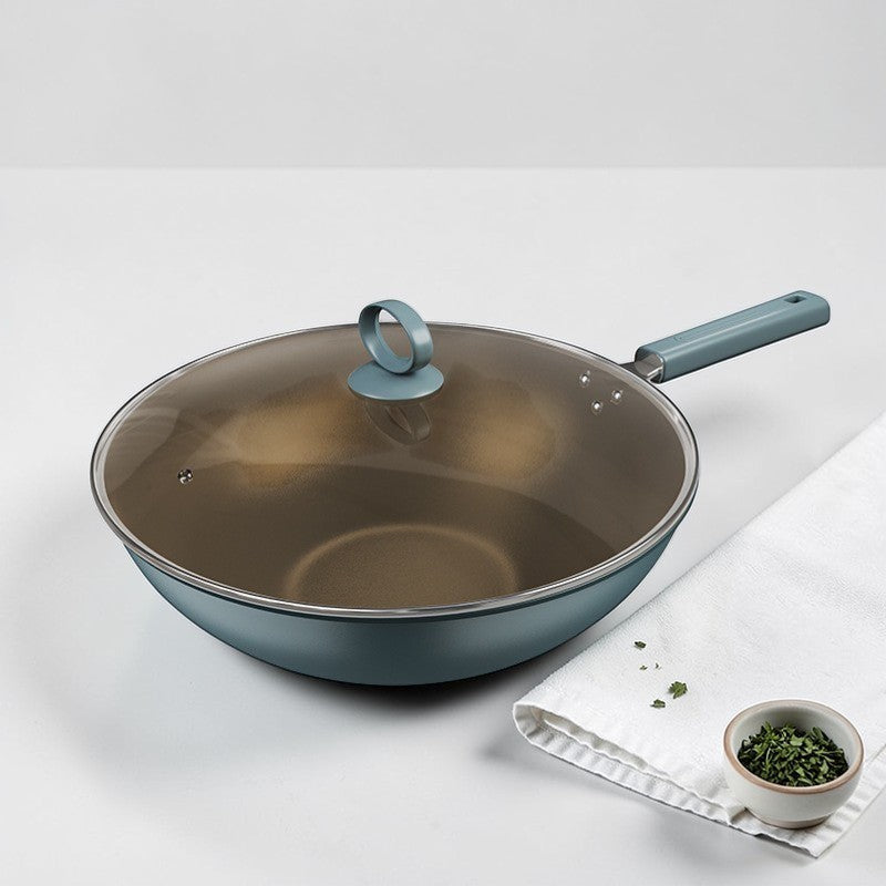 Le Maroki smeedijzeren wok met antiaanbaklaag op gaskookplaat