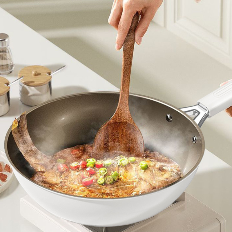 Le Rinoka keramische wok met glazen deksel binnenzijde coating