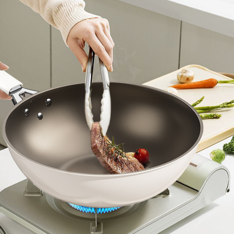 Le Rinoka keramische wok met glazen deksel zijaanzicht profiel