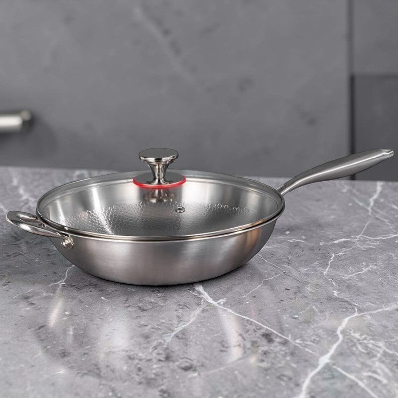 Le Honari rvs wok met glazen deksel verpakking en inhoud