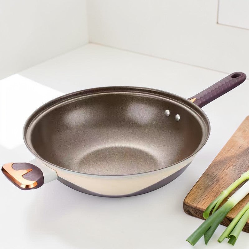 Le Kasuna aluminium wok pan met deksel handvat materiaal detail