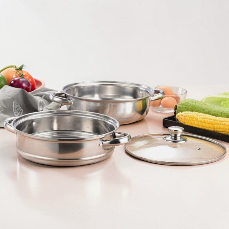 Le Senami rvs wok stoompan set in gebruik op kookplaat