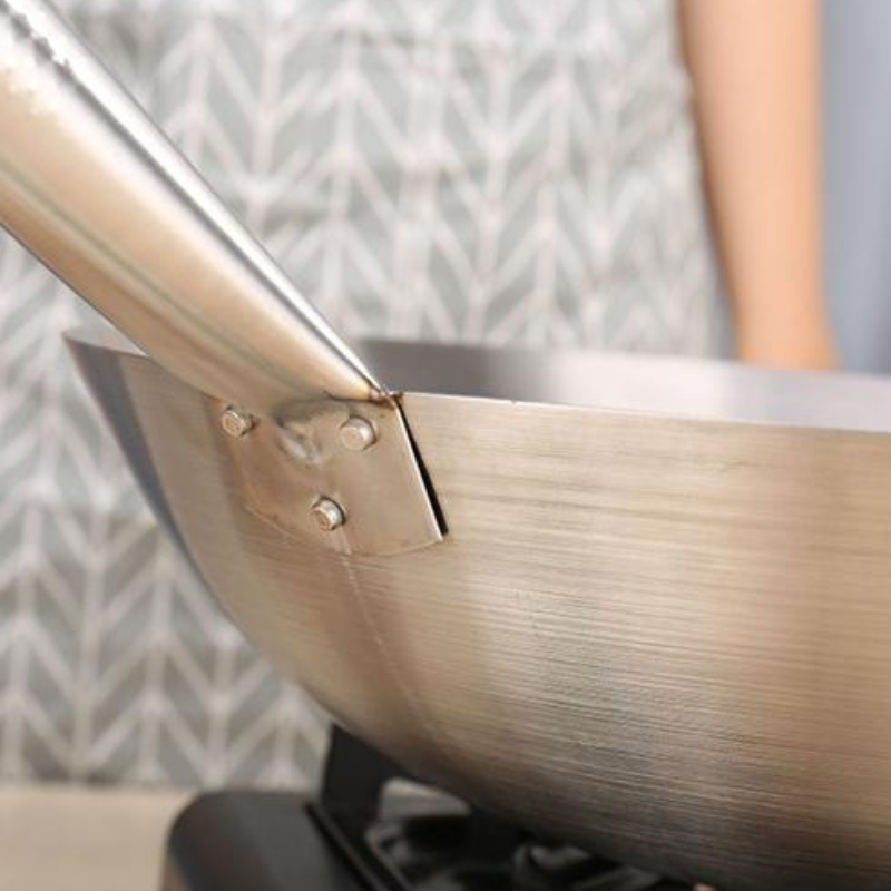 Le Asama rvs wok 32 cm verpakking met productinformatie en inhoud