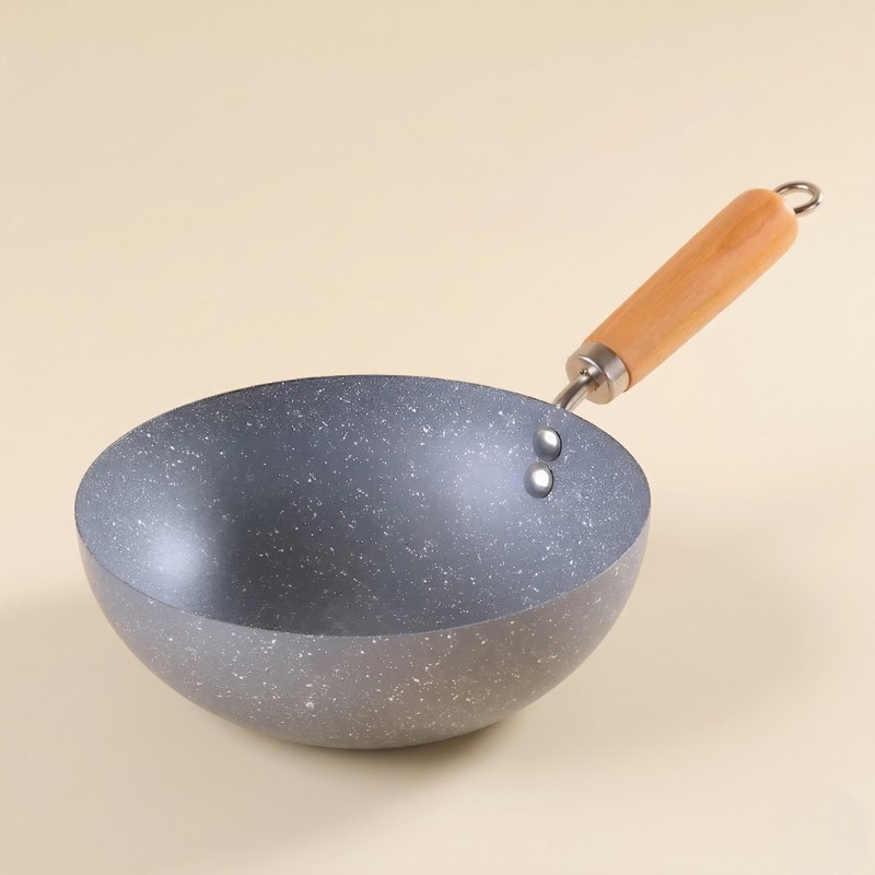 Le Sanome detailopname handvat en rand mini wok inductie