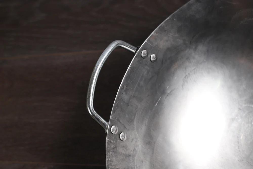 Le Gassan Chinese wok houten handvat close-up bamboe greep
