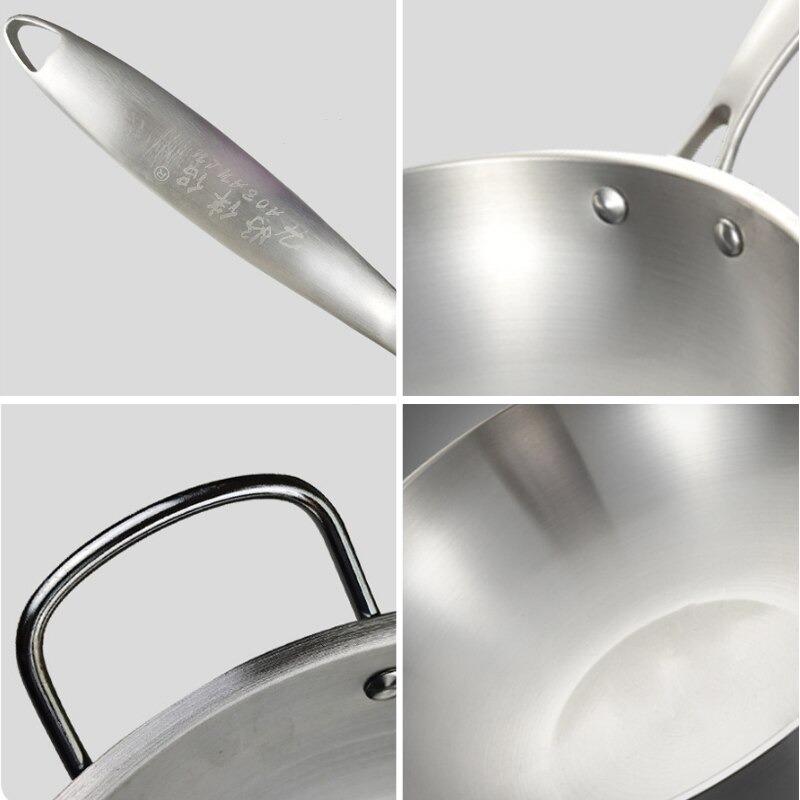 Le Kaimon rvs wok zonder coating schuine detailopname rand en steel