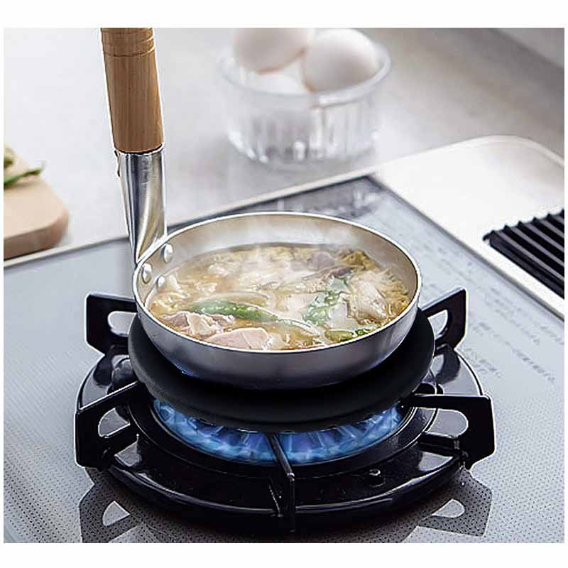 Le Tomura wok support gietijzeren verpakking en inhoud