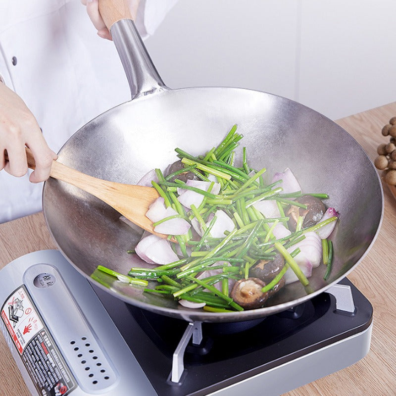 Le Benkoa koolstofstaal rondbodem wokpan op traditionele wokbrander