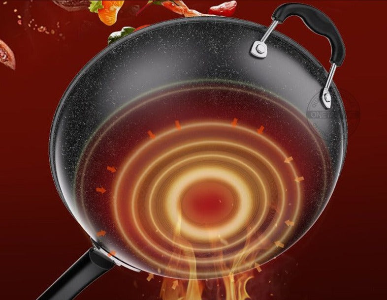Le Lanska zwart koolstofstaal wok schuin bovenaanzicht met helper handvat