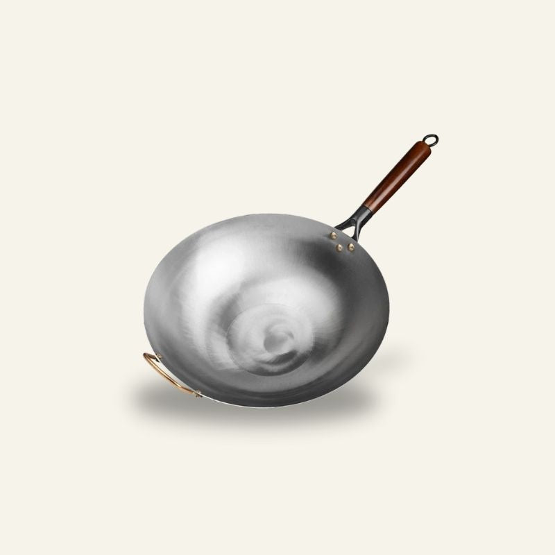 Le Pankon traditionele koolstofstaal wokpan detailopname materiaal